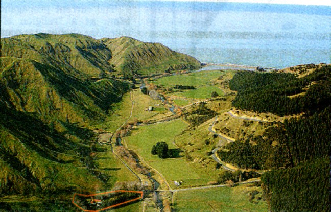 Aerial view of the valley with the house highlighted